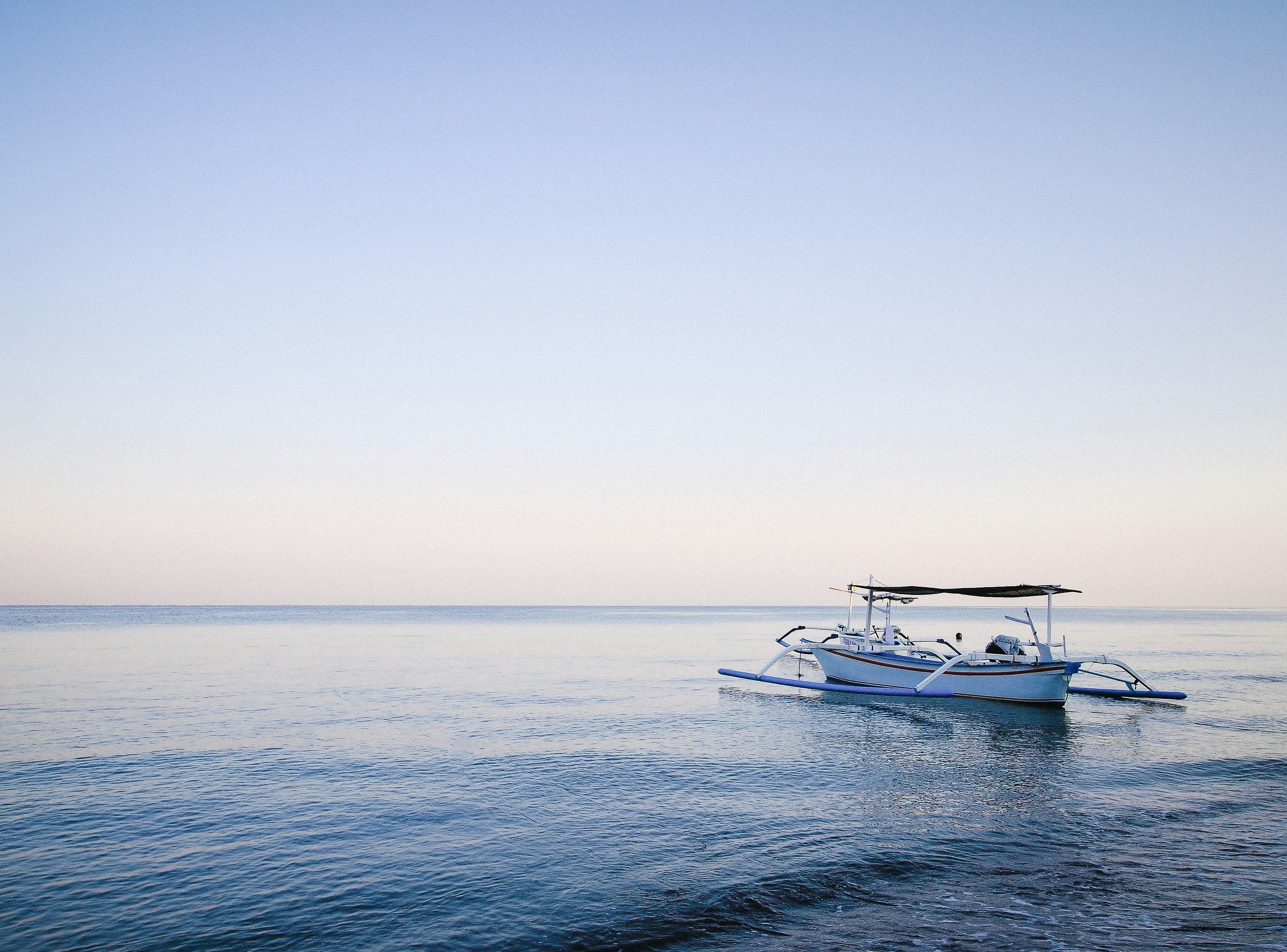 boat on body of water during daytime